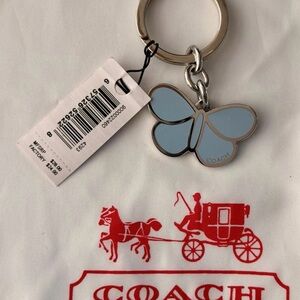 NWT Coach Butterfly Bag Charm in light blue resin and metal
